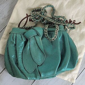Junior Drake Shiny turquoise cross shoulder bag.